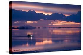 Travelers Drive their Suv across a the Salar De Uyuni, a Flooded Salt Flat, in Bolivia-Sergio Ballivian-Stretched Canvas