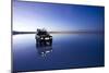 Travelers Drive their Suv across a the Salar De Uyuni, a Flooded Salt Flat, in Bolivia-Sergio Ballivian-Mounted Photographic Print