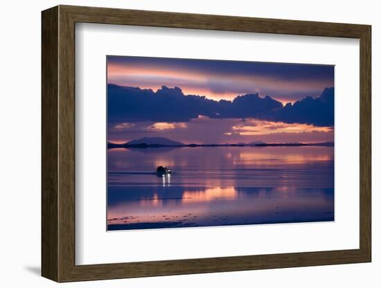 Travelers Drive their Suv across a the Salar De Uyuni, a Flooded Salt Flat, in Bolivia-Sergio Ballivian-Framed Photographic Print