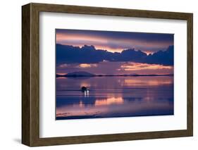 Travelers Drive their Suv across a the Salar De Uyuni, a Flooded Salt Flat, in Bolivia-Sergio Ballivian-Framed Photographic Print