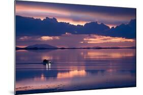 Travelers Drive their Suv across a the Salar De Uyuni, a Flooded Salt Flat, in Bolivia-Sergio Ballivian-Mounted Photographic Print