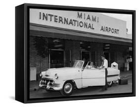 Travelers in a Chevy Bel Air Convertible at the Miami International Airport, 1954 August 22-null-Framed Stretched Canvas