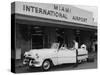 Travelers in a Chevy Bel Air Convertible at the Miami International Airport, 1954 August 22-null-Stretched Canvas