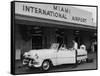 Travelers in a Chevy Bel Air Convertible at the Miami International Airport, 1954 August 22-null-Framed Stretched Canvas