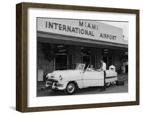 Travelers in a Chevy Bel Air Convertible at the Miami International Airport, 1954 August 22-null-Framed Photographic Print