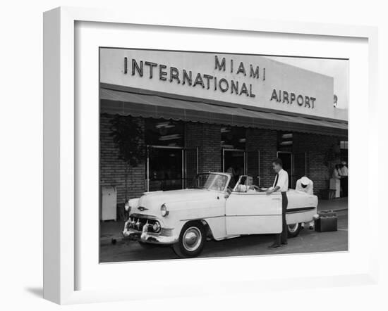 Travelers in a Chevy Bel Air Convertible at the Miami International Airport, 1954 August 22-null-Framed Photographic Print