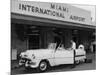 Travelers in a Chevy Bel Air Convertible at the Miami International Airport, 1954 August 22-null-Mounted Photographic Print
