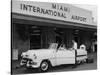 Travelers in a Chevy Bel Air Convertible at the Miami International Airport, 1954 August 22-null-Stretched Canvas