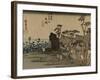 Travelers Walk in the Rain Toward a Narrow Street with Huts, Behind the Sea Is Visible-Utagawa Hiroshige-Framed Art Print