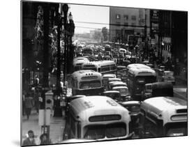 Traveling Through Rush Hour Traffic in Downtown Los Angeles-Loomis Dean-Mounted Photographic Print