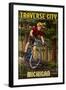 Traverse City, Michigan - Mountain Biker in Trees-Lantern Press-Framed Art Print