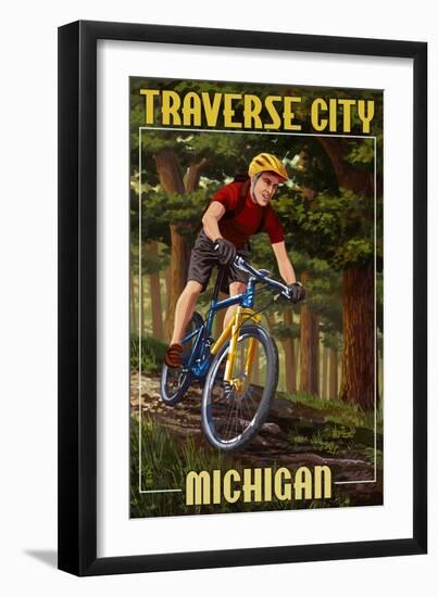 Traverse City, Michigan - Mountain Biker in Trees-Lantern Press-Framed Art Print
