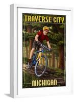 Traverse City, Michigan - Mountain Biker in Trees-Lantern Press-Framed Art Print