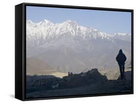 Trekker at Dawn Looking out Over the Old Fortified Village of Jharkot on the Annapurna Circuit Trek-Don Smith-Framed Stretched Canvas