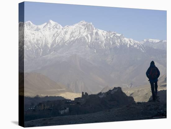 Trekker at Dawn Looking out Over the Old Fortified Village of Jharkot on the Annapurna Circuit Trek-Don Smith-Stretched Canvas