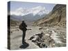 Trekker Enjoys the View on the Annapurna Circuit Trek, Jomsom, Himalayas, Nepal-Don Smith-Stretched Canvas