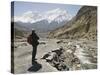 Trekker Enjoys the View on the Annapurna Circuit Trek, Jomsom, Himalayas, Nepal-Don Smith-Stretched Canvas