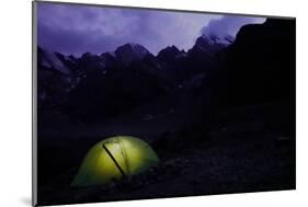 Trekker's tent lit inside at night in the remote and spectacular Fann Mountains, Tajikistan-David Pickford-Mounted Photographic Print