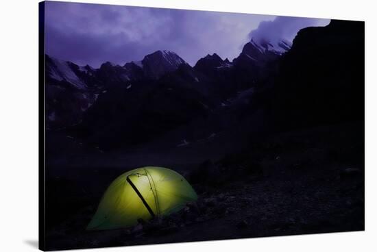 Trekker's tent lit inside at night in the remote and spectacular Fann Mountains, Tajikistan-David Pickford-Stretched Canvas