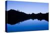 Trekkers are Reflected in the Cool Waters of Chilata Lagoon Outside the Town of Sorata, Bolivia-Sergio Ballivian-Stretched Canvas