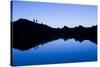 Trekkers are Reflected in the Cool Waters of Chilata Lagoon Outside the Town of Sorata, Bolivia-Sergio Ballivian-Stretched Canvas