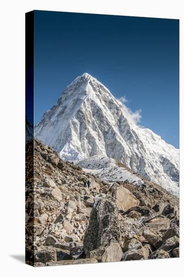 Trekkers on a trail with Mt. Pumori in background.-Lee Klopfer-Stretched Canvas