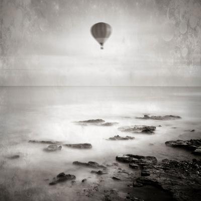 'A Hot Air Balloon Floating Above the Sea' Photographic Print - Trigger  Image | AllPosters.com