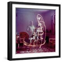 Triple Exposure of Artist Pablo Picasso Drawing with Light at His Home in Vallauris-Gjon Mili-Framed Premium Photographic Print