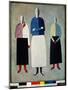 Trois Femmes (Three Girls). Les Trois Ont Le Crane Chauve, Vetues D'une Jupe Droite Et D'un Gilet B-Kazimir Severinovich Malevich-Mounted Giclee Print