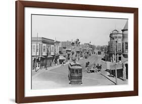 Trolley Cars Driving through Las Vegas-null-Framed Photographic Print