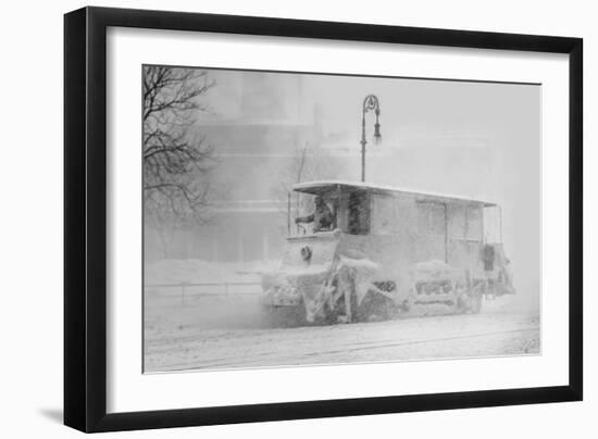 Trolley Snowplow Pushes Ahead in Heavy Snowfall on New York Streets-null-Framed Art Print