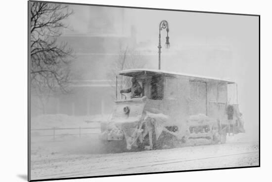 Trolley Snowplow Pushes Ahead in Heavy Snowfall on New York Streets-null-Mounted Art Print