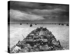 Troops Packed LCI Trailing in Wake of Coast Guard Manned LST for Invasion of Cape Sansapor-Harry Watson-Stretched Canvas