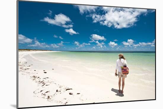 Tropical Beach with Blue Sky and White Sand with Female Looking across Bay-Will Wilkinson-Mounted Photographic Print