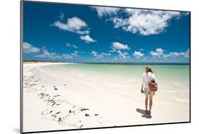 Tropical Beach with Blue Sky and White Sand with Female Looking across Bay-Will Wilkinson-Mounted Photographic Print