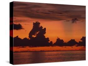 Tropical Sunset Off Seven Mile Beach, Cayman Islands, West Indies, Central America-Tomlinson Ruth-Stretched Canvas