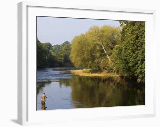 Trout Fisherman Casting to a Fish on the River Dee, Wrexham, Wales-John Warburton-lee-Framed Photographic Print