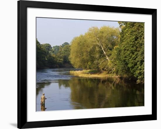 Trout Fisherman Casting to a Fish on the River Dee, Wrexham, Wales-John Warburton-lee-Framed Photographic Print