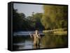 Trout Fisherman Casting to a Fish on the River Dee, Wrexham, Wales-John Warburton-lee-Framed Stretched Canvas