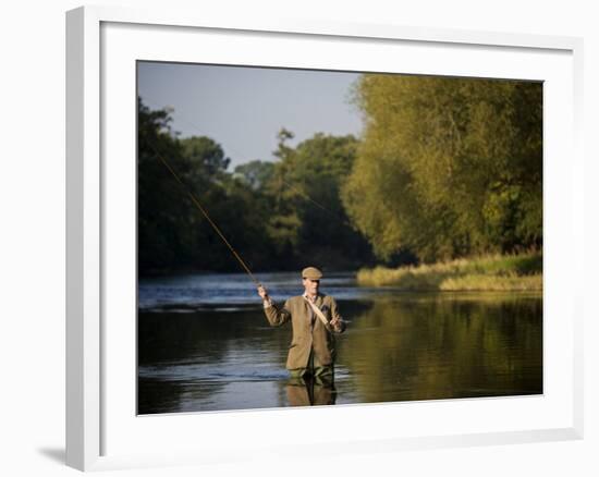 Trout Fisherman Casting to a Fish on the River Dee, Wrexham, Wales-John Warburton-lee-Framed Photographic Print