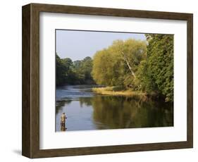 Trout Fisherman Casting to a Fish on the River Dee, Wrexham, Wales-John Warburton-lee-Framed Photographic Print