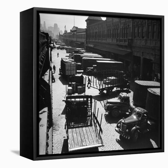 Trucks Clog Roadway in Front of Street-Level Entrances to Long Row of Hudson River Piers on West St-Andreas Feininger-Framed Stretched Canvas