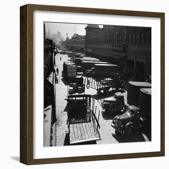 Trucks Clog Roadway in Front of Street-Level Entrances to Long Row of Hudson River Piers on West St-Andreas Feininger-Framed Photographic Print