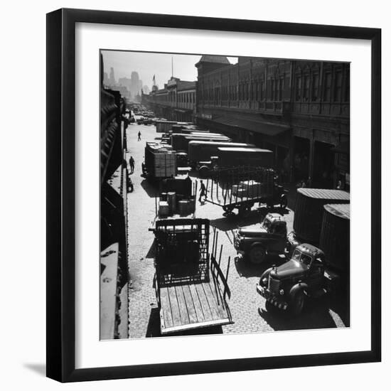 Trucks Clog Roadway in Front of Street-Level Entrances to Long Row of Hudson River Piers on West St-Andreas Feininger-Framed Photographic Print