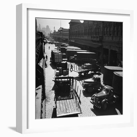 Trucks Clog Roadway in Front of Street-Level Entrances to Long Row of Hudson River Piers on West St-Andreas Feininger-Framed Photographic Print