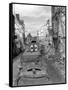 Trucks Driving Through the Ruined Town of Falaise-null-Framed Stretched Canvas