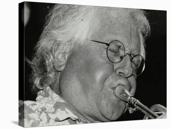 Trumpeter Henry Lowther Playing at the Fairway, Welwyn Garden City, Hertfordshire, 1 October 2000-Denis Williams-Stretched Canvas