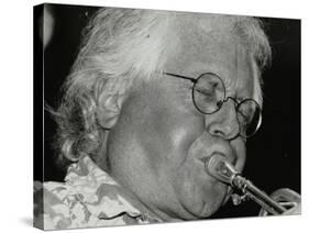 Trumpeter Henry Lowther Playing at the Fairway, Welwyn Garden City, Hertfordshire, 1 October 2000-Denis Williams-Stretched Canvas