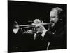 Trumpeter Keith Smith Playing at Stevenage, Hertfordshire, 1984-Denis Williams-Mounted Photographic Print