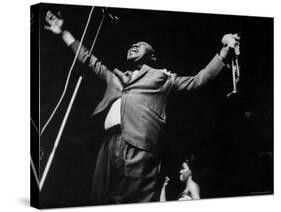 Trumpeter Louis Armstrong Belting Out His Famous Rendition of the Song "Hello Dolly" in a Nightclub-John Loengard-Stretched Canvas